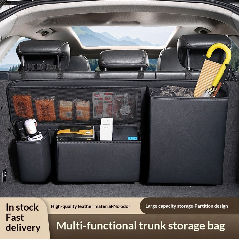 Vehicle trunk organizer holding travel and emergency essentials