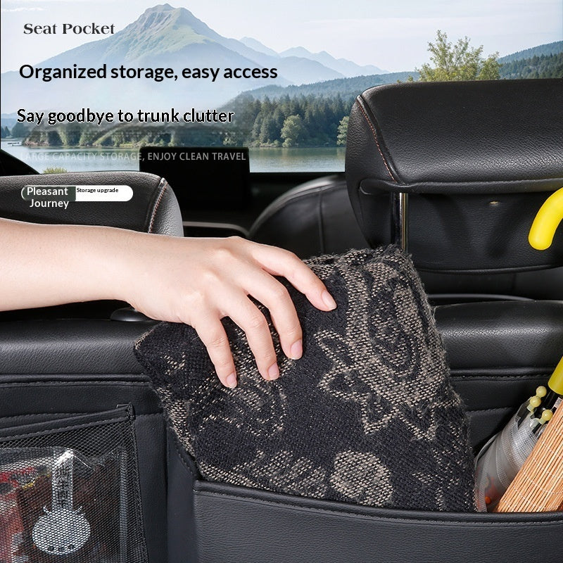 Hanging car trunk organizer with multiple storage compartments.
